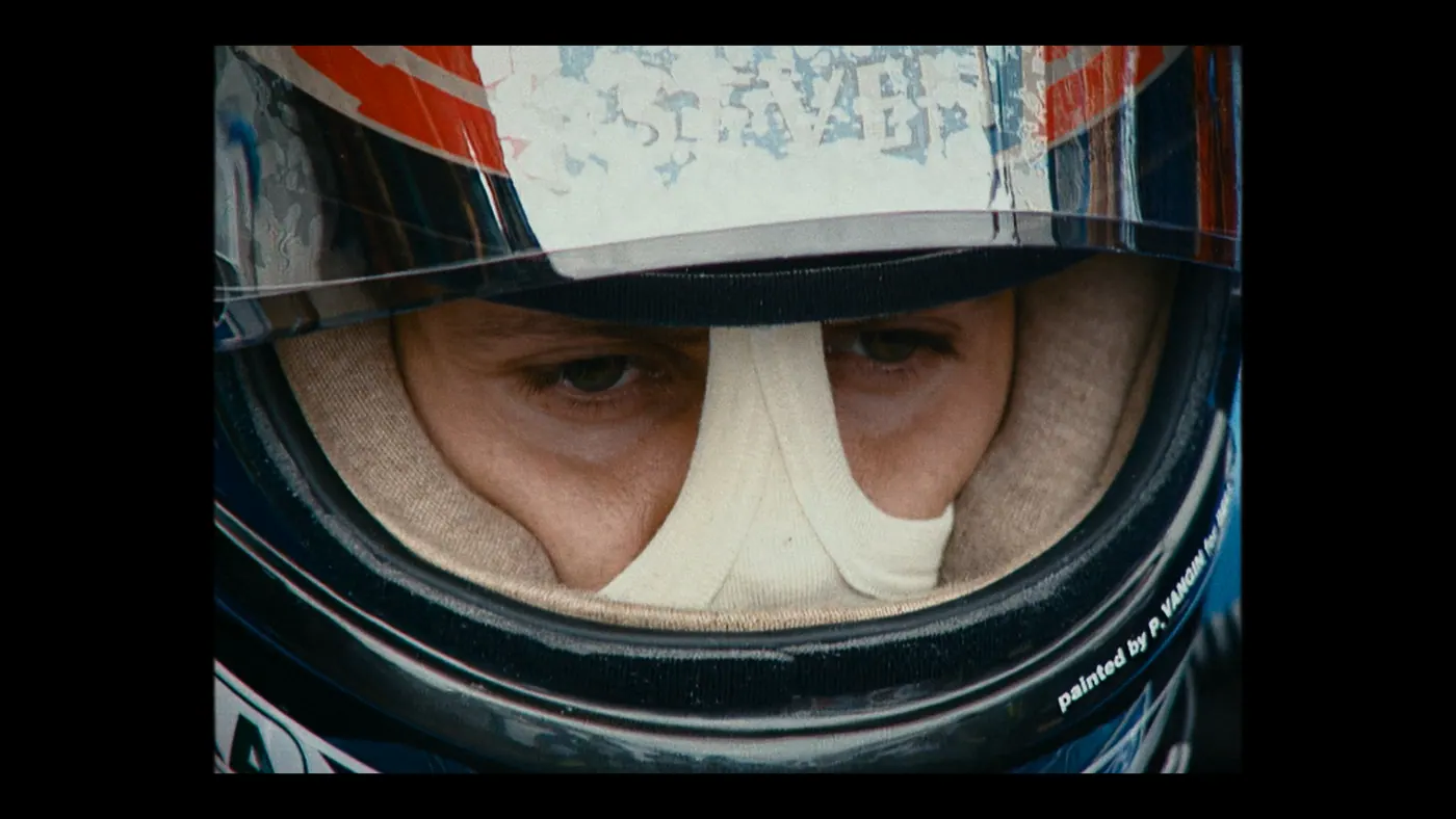 Schumacher ’94 — The Birth of a Legend (2026), Christin Freitag — très gros plan, un personnage : cagoule blanche, casque
